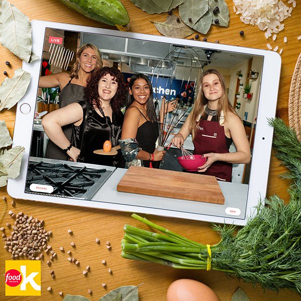 Four girls posing in food network kitchen photo booth green screen